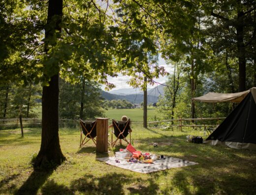 A tent in a field.