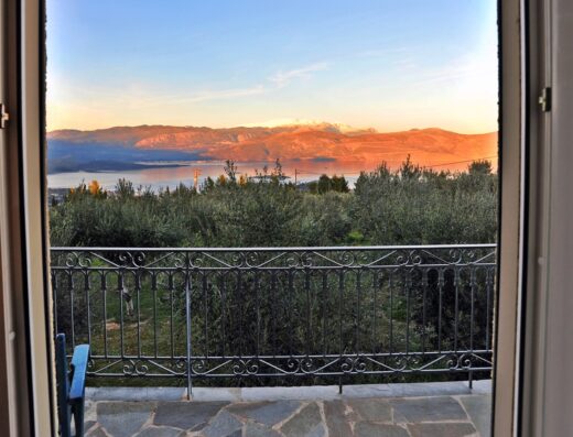 A view of the mountains from an open door.