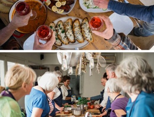 A group of people are sitting around a table and eating food.